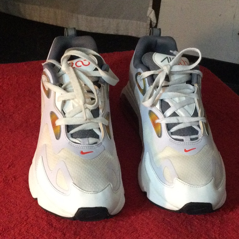 White and Gray Sneakers with Orange Accents